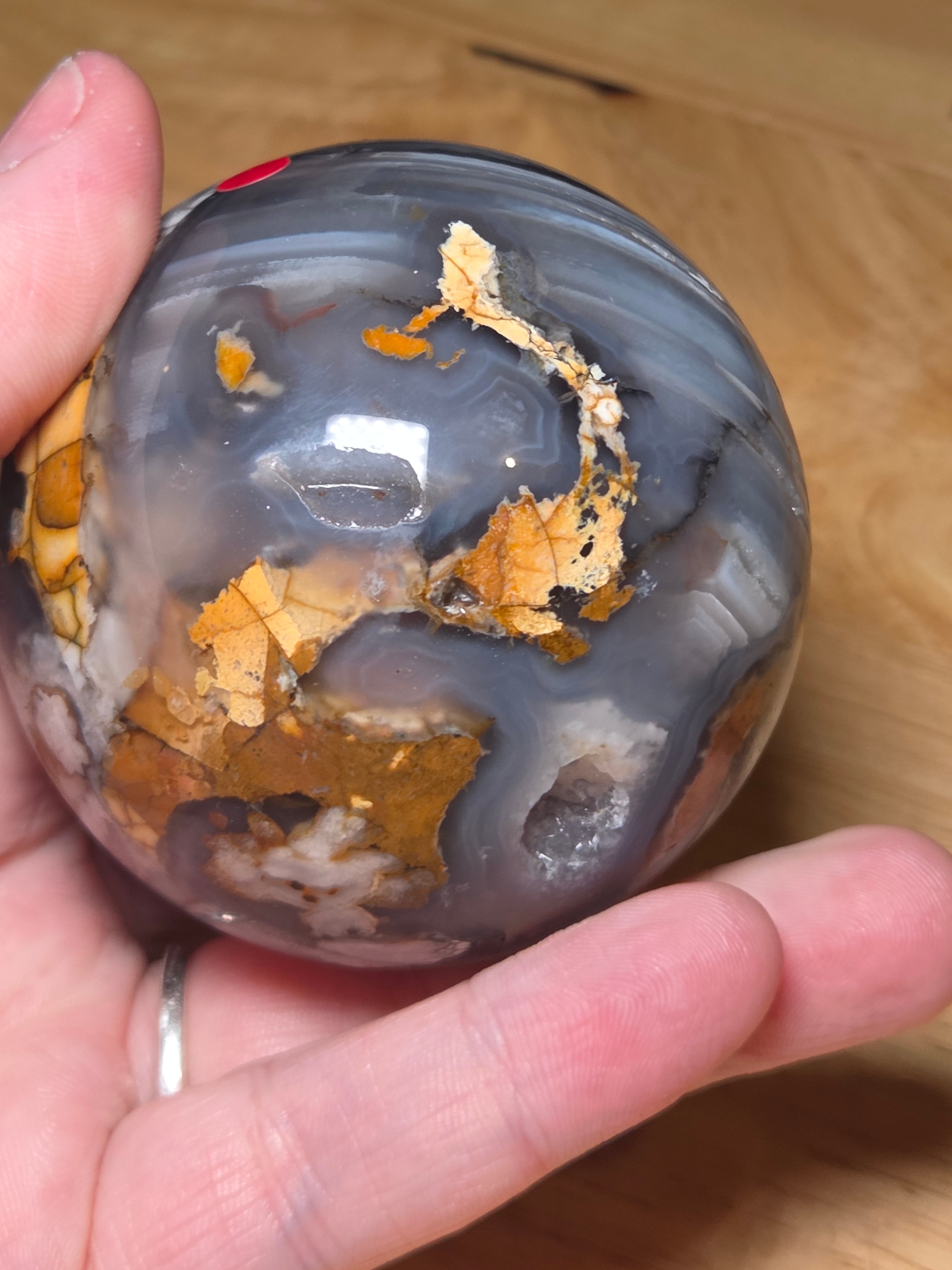 Natural black flower agate crystal sphere