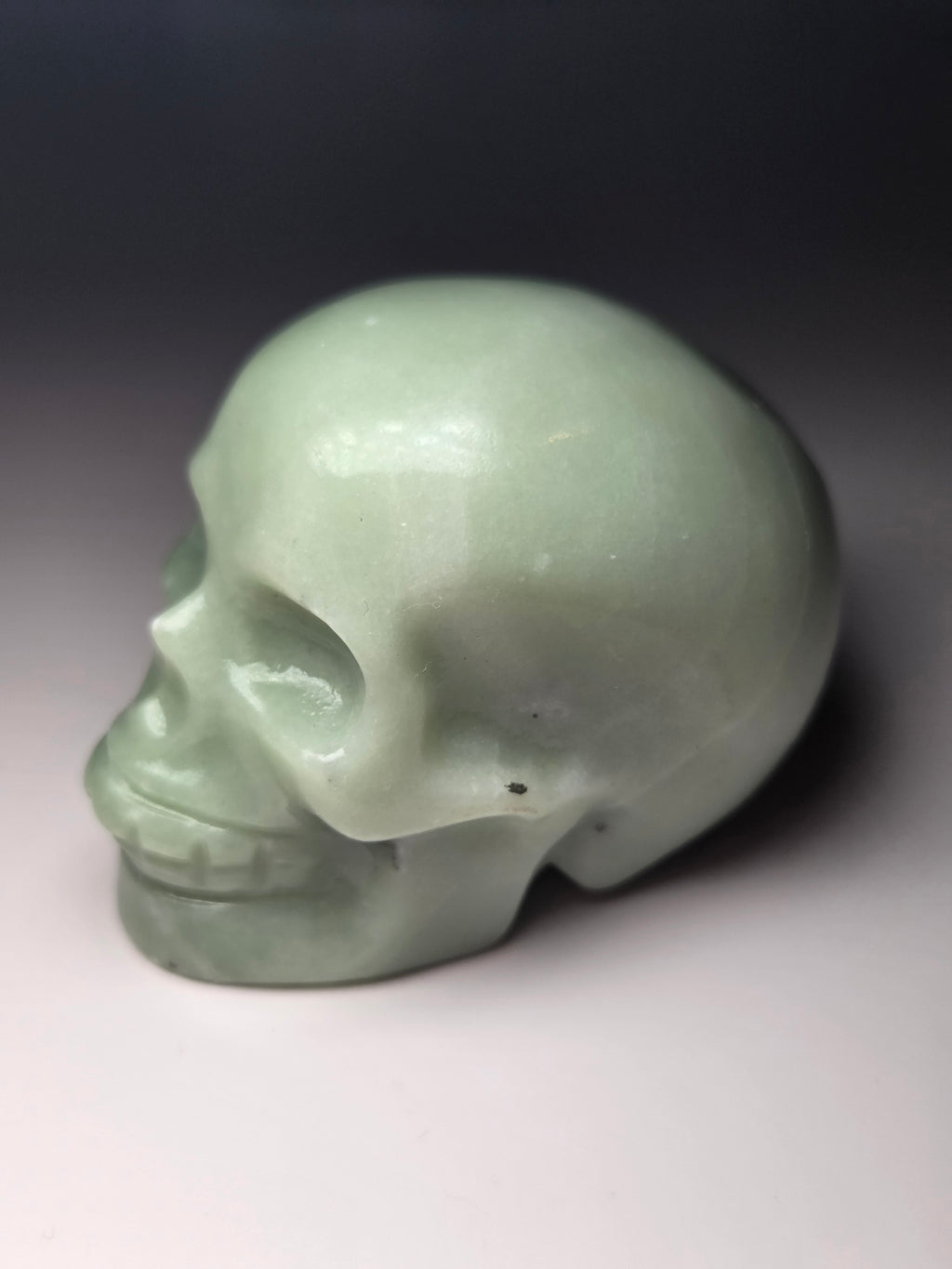 Green jade crystal skull carving