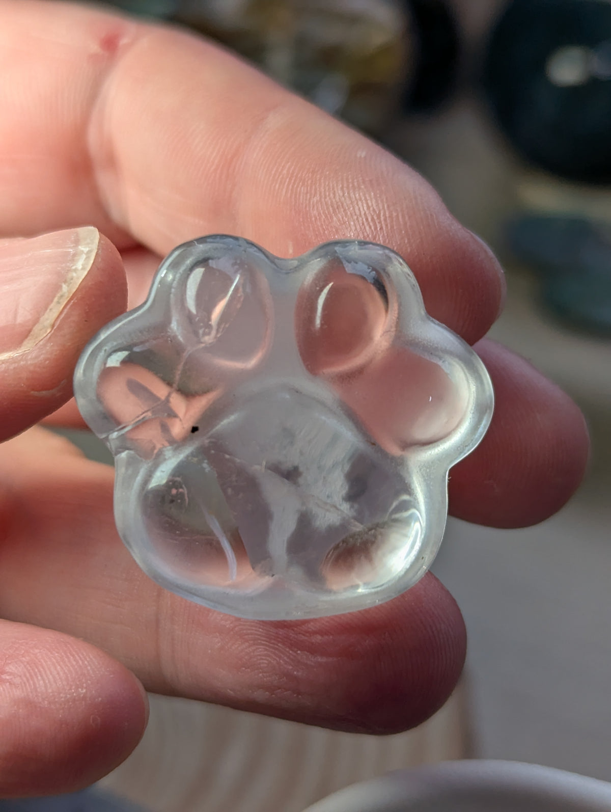 Clear quartz crystal paw print