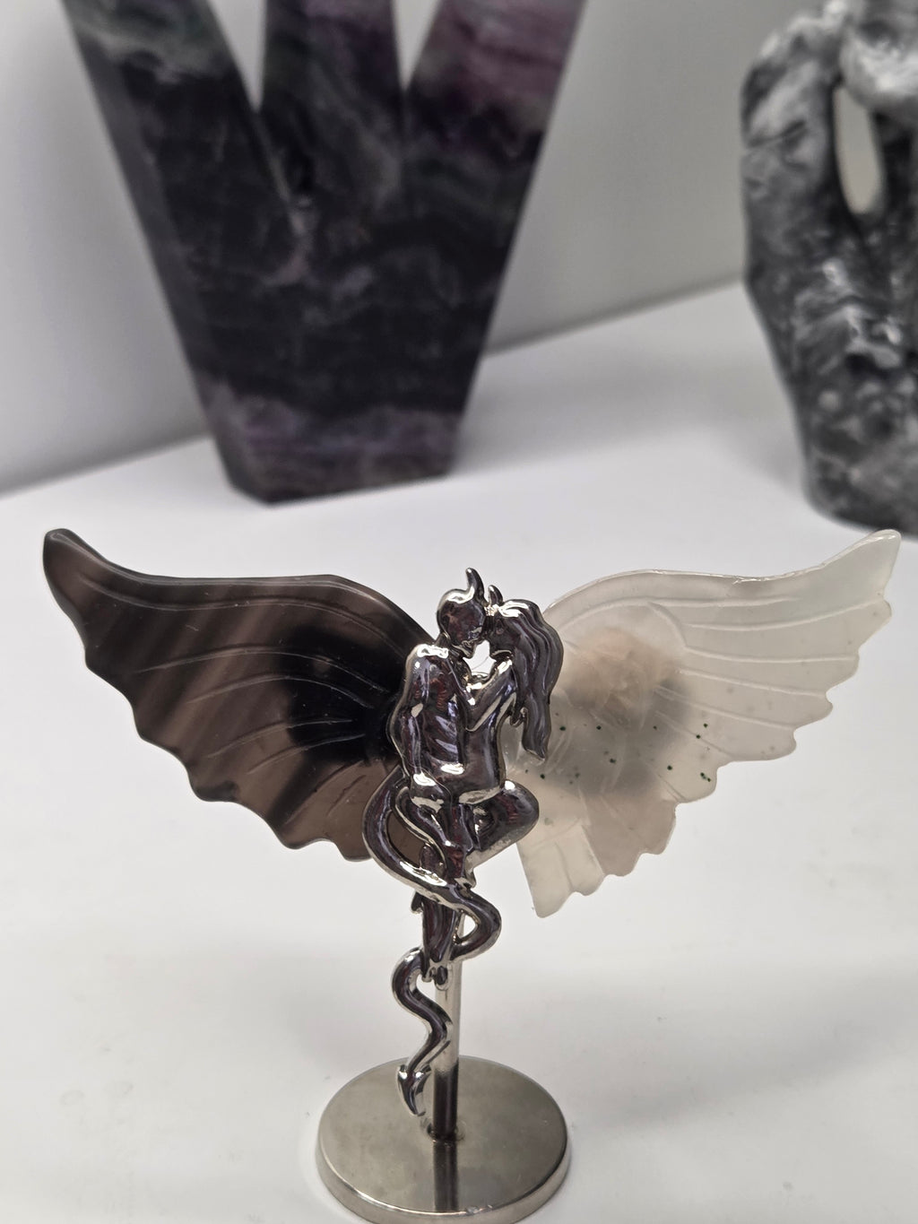 Devil and angel crystal carving