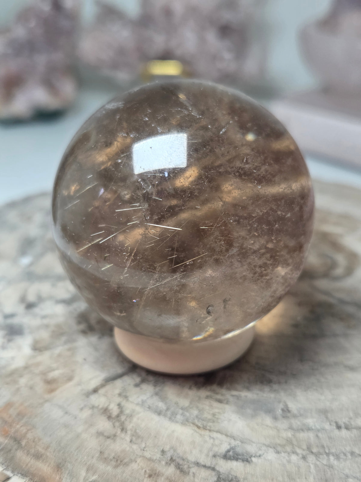 Golden rutile crystal sphere