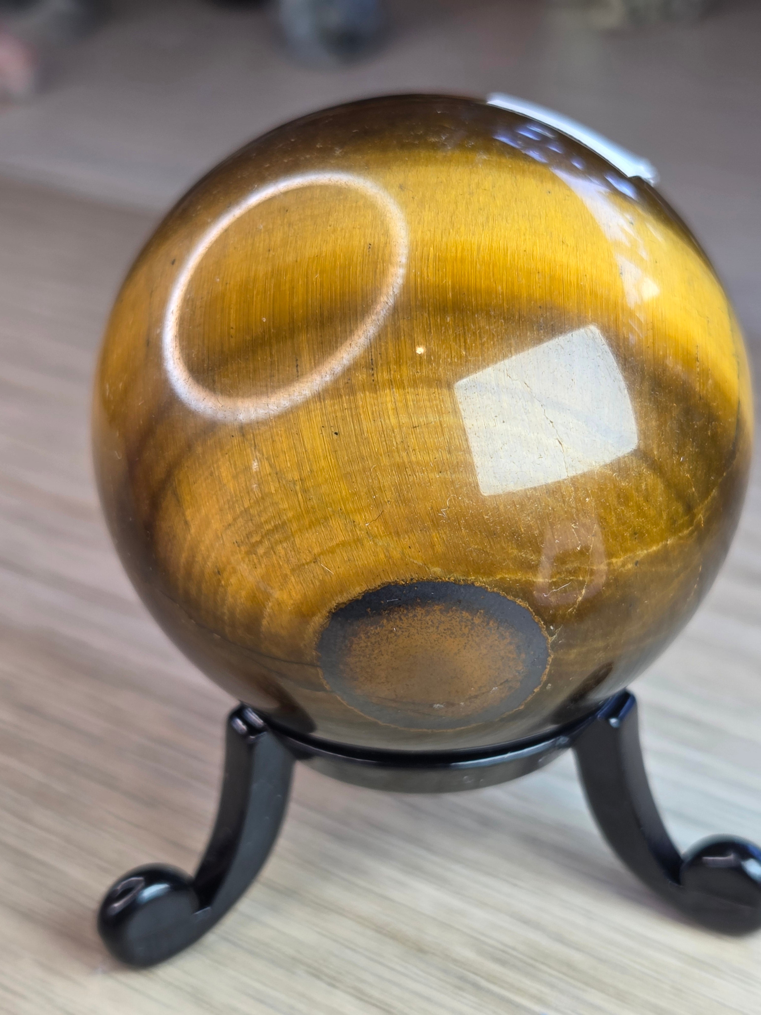 Tigers eye crystal sphere