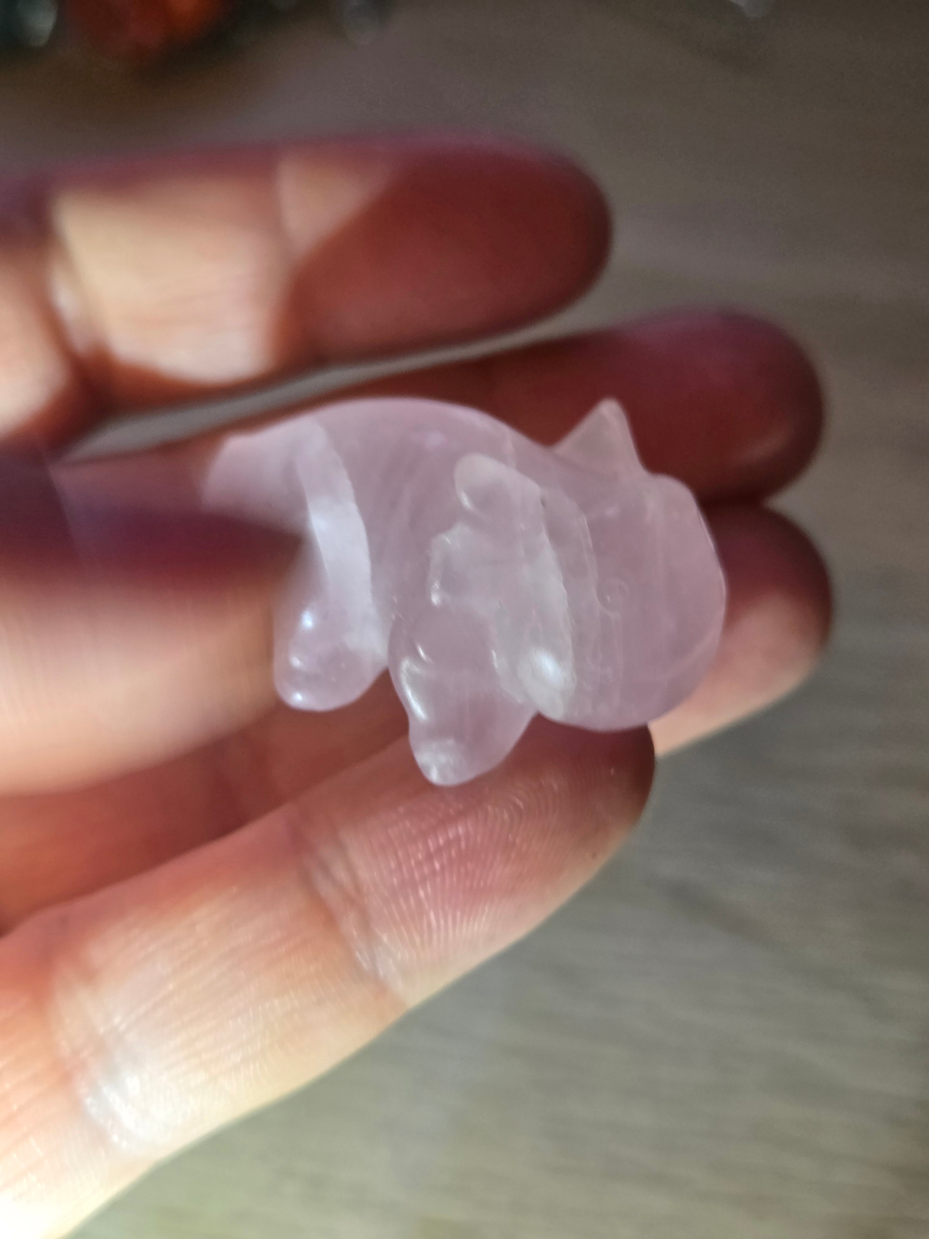Rose quartz crystal axolotl carving