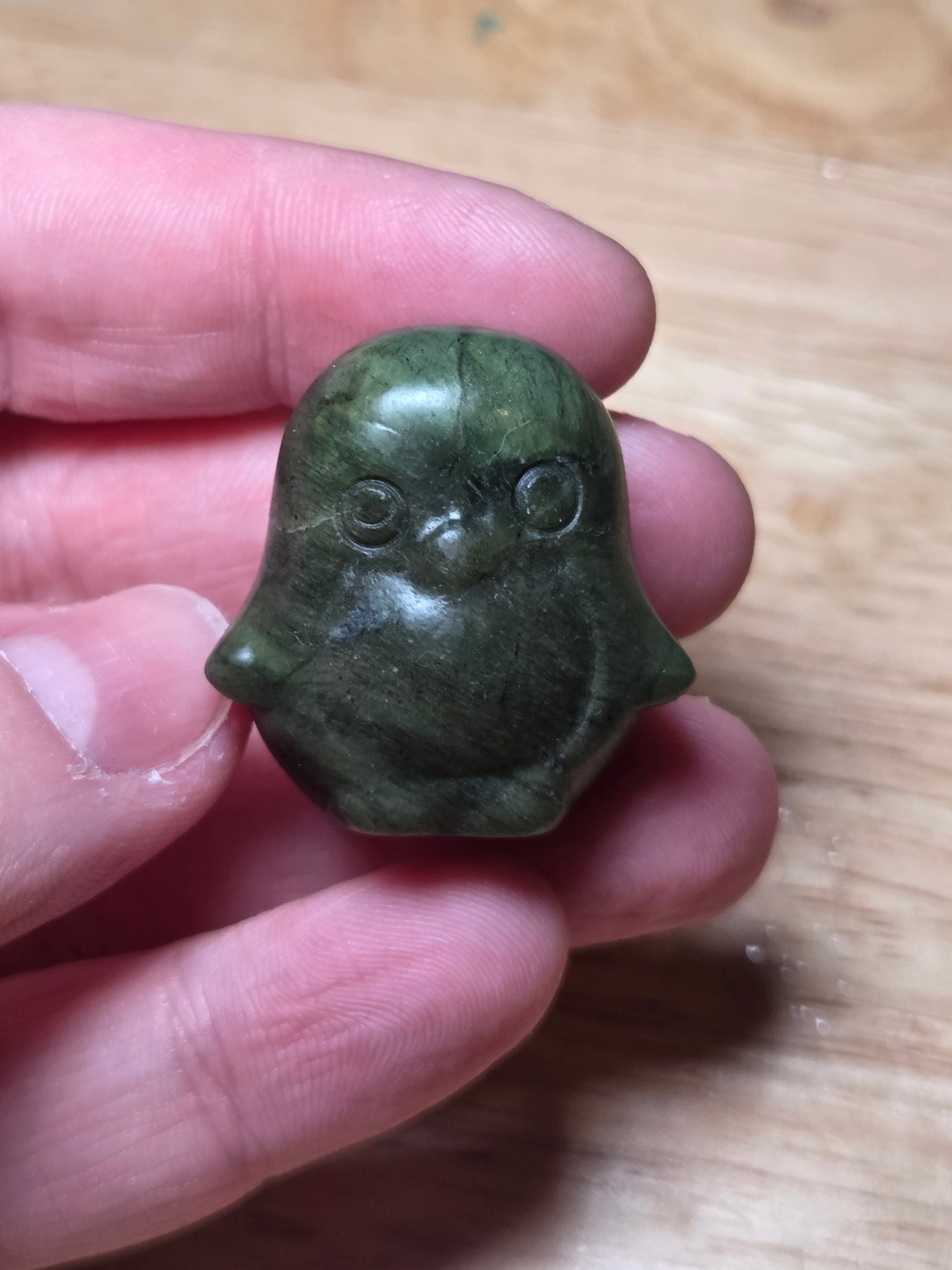 Green jade penguin carving