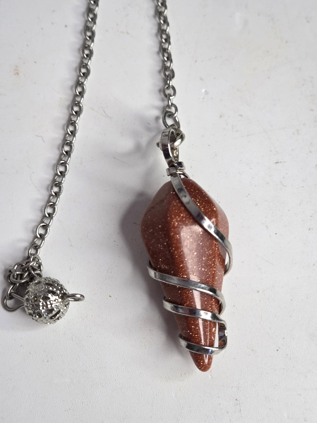 Golden Sandstone pendulum