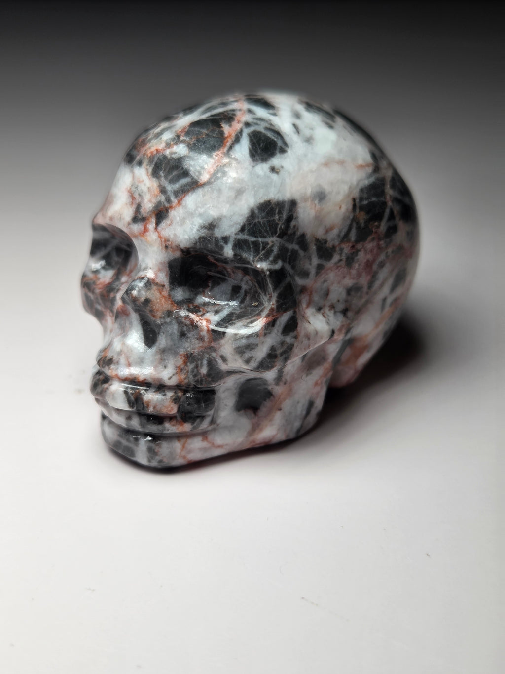 Red vain jasper crystal skull