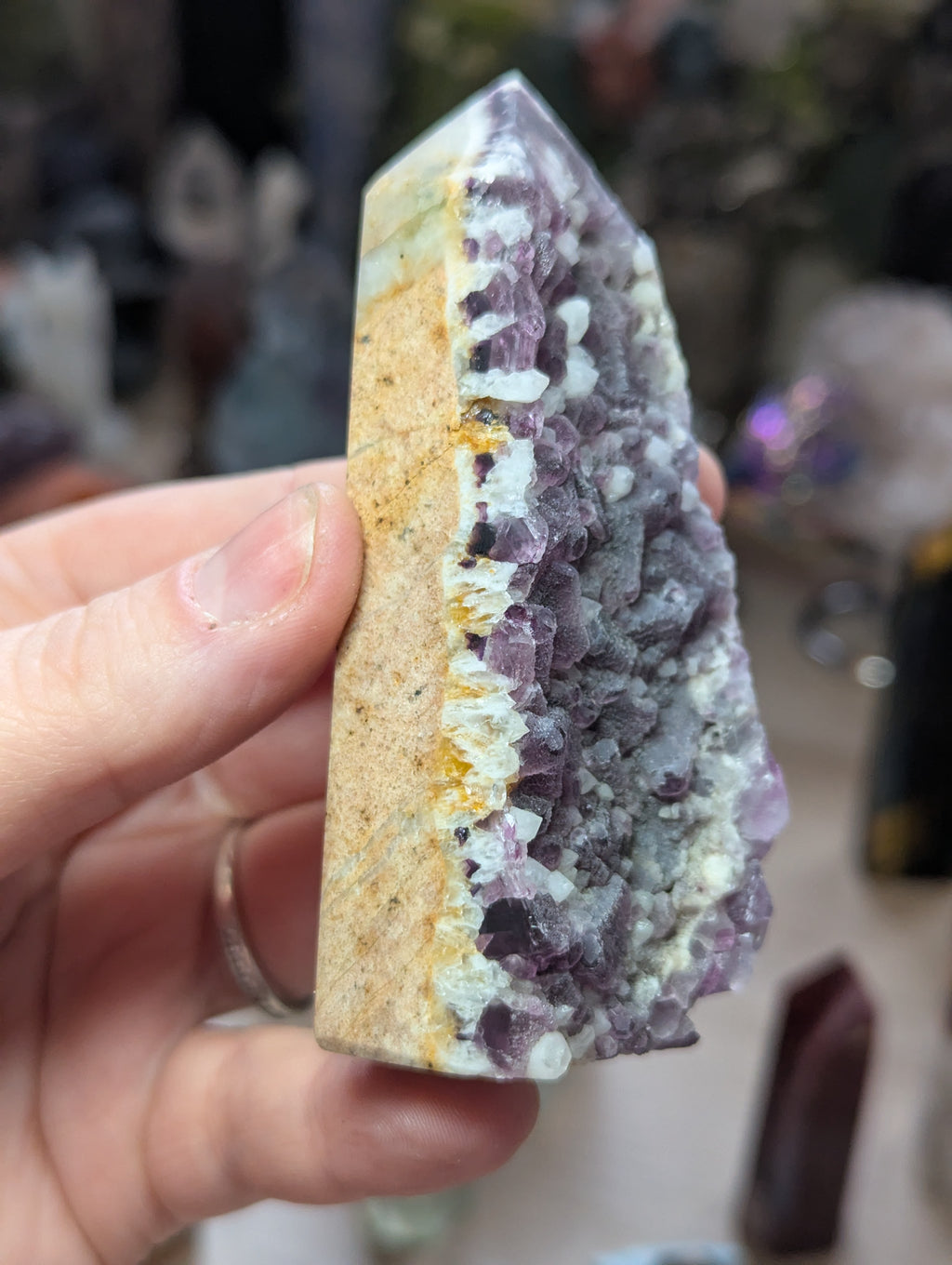 Raw flourite crystal tower carving