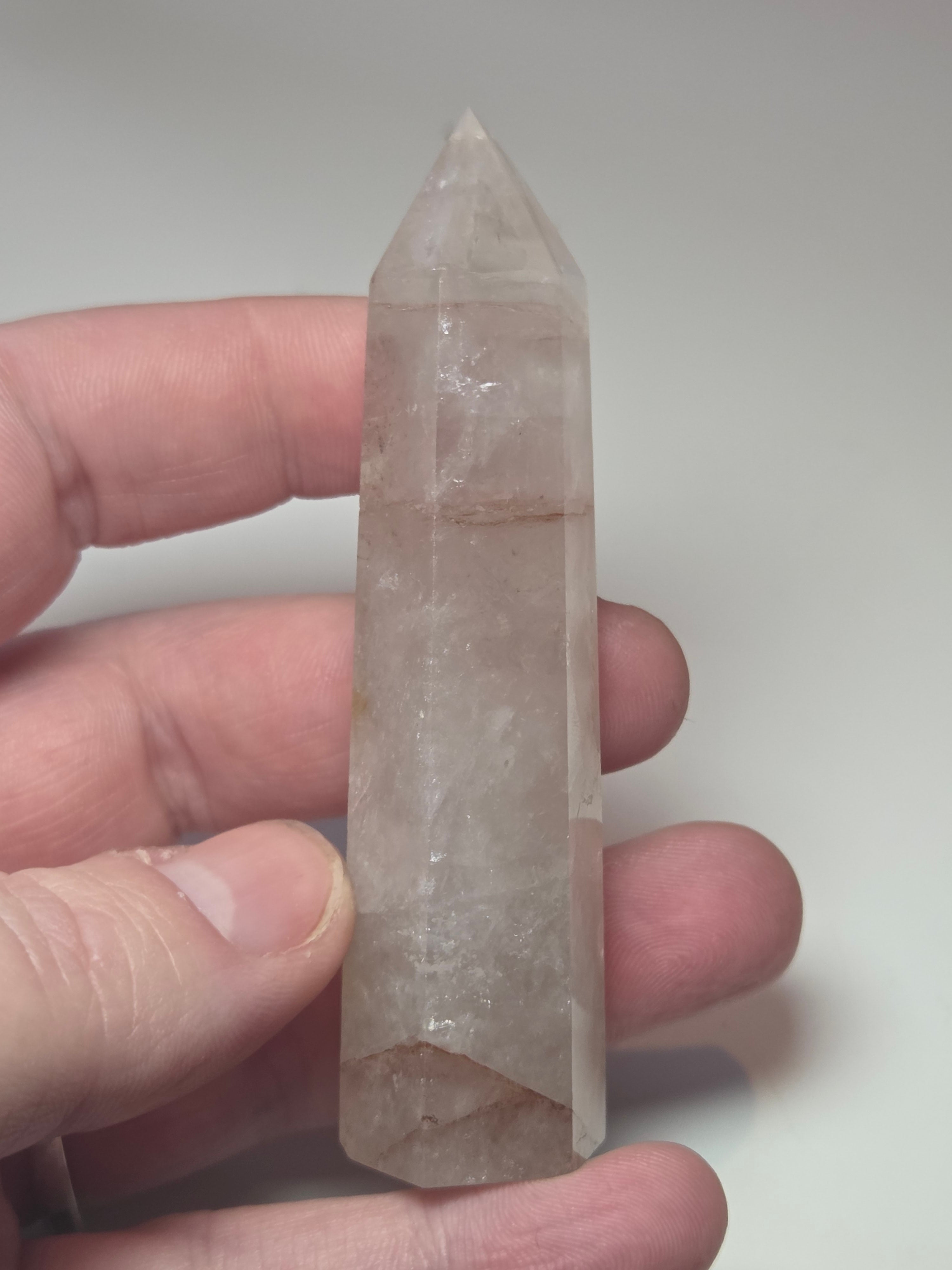 Fire quartz crystal tower carving with imperfections