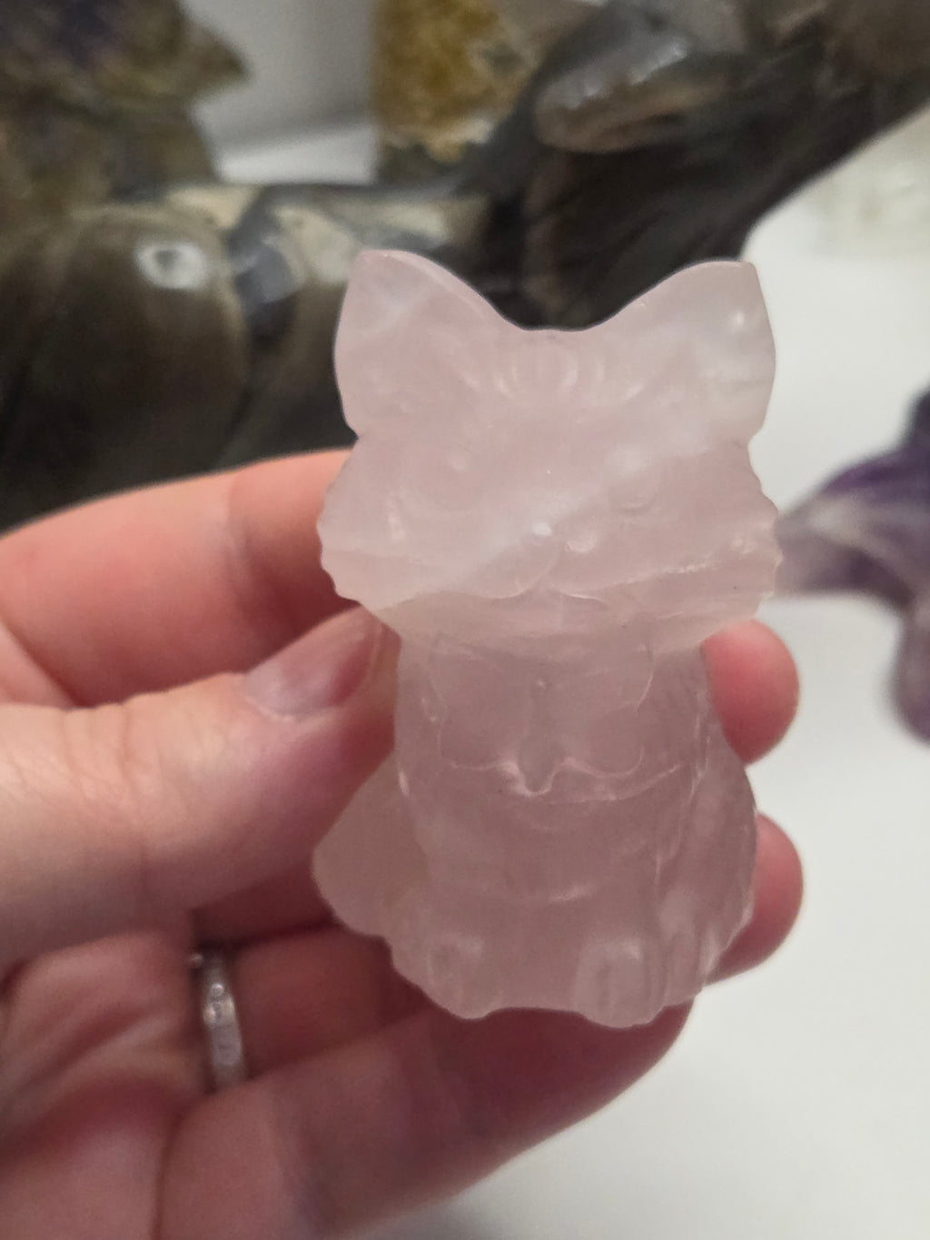 Rose quartz crystal cat carving