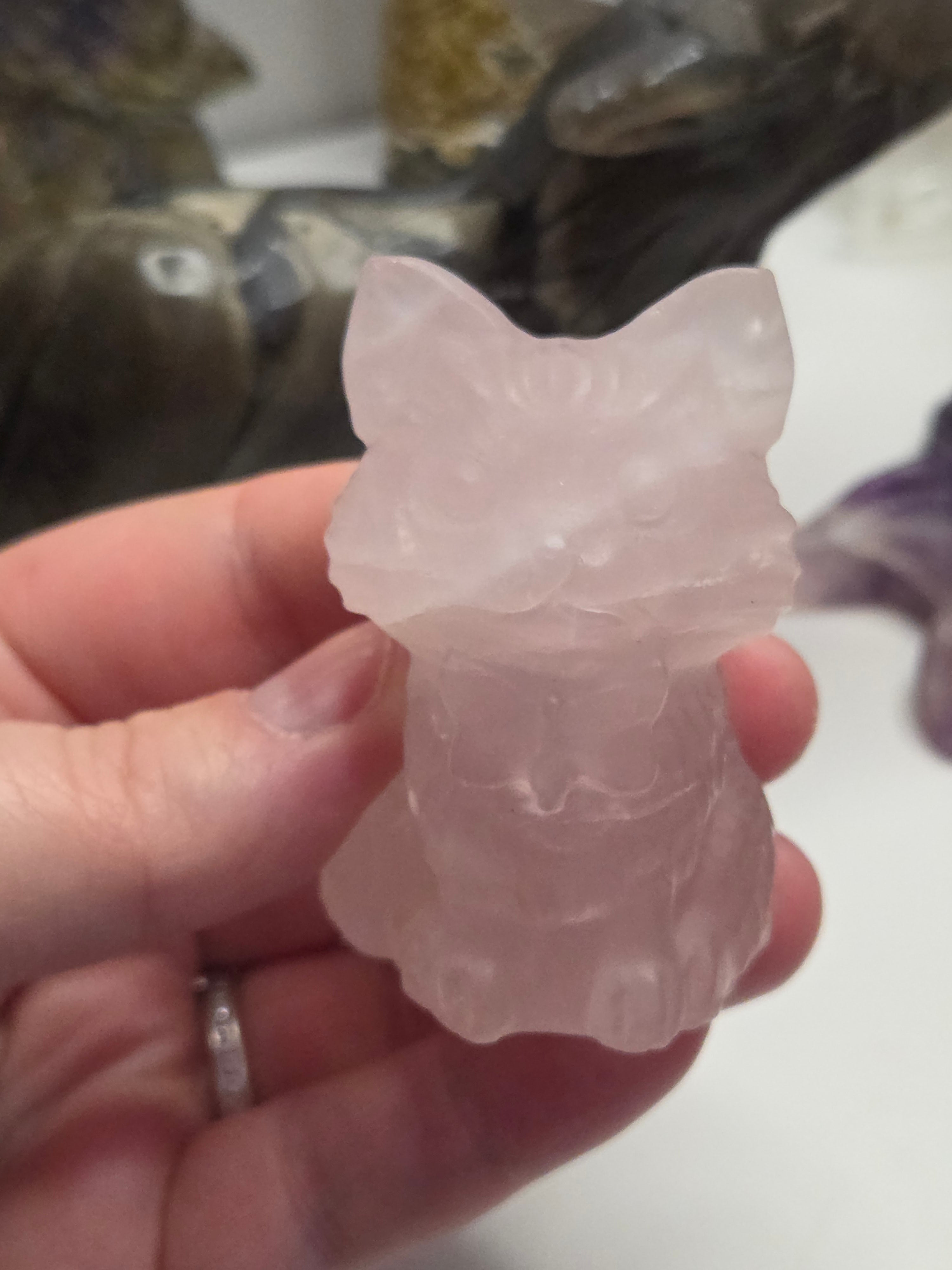 Rose quartz crystal cat carving