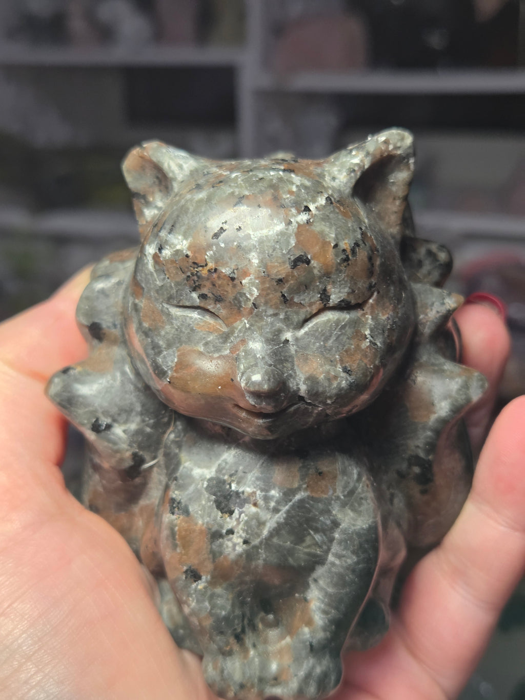 Large Yooperlite crystal 9 tail fox carving