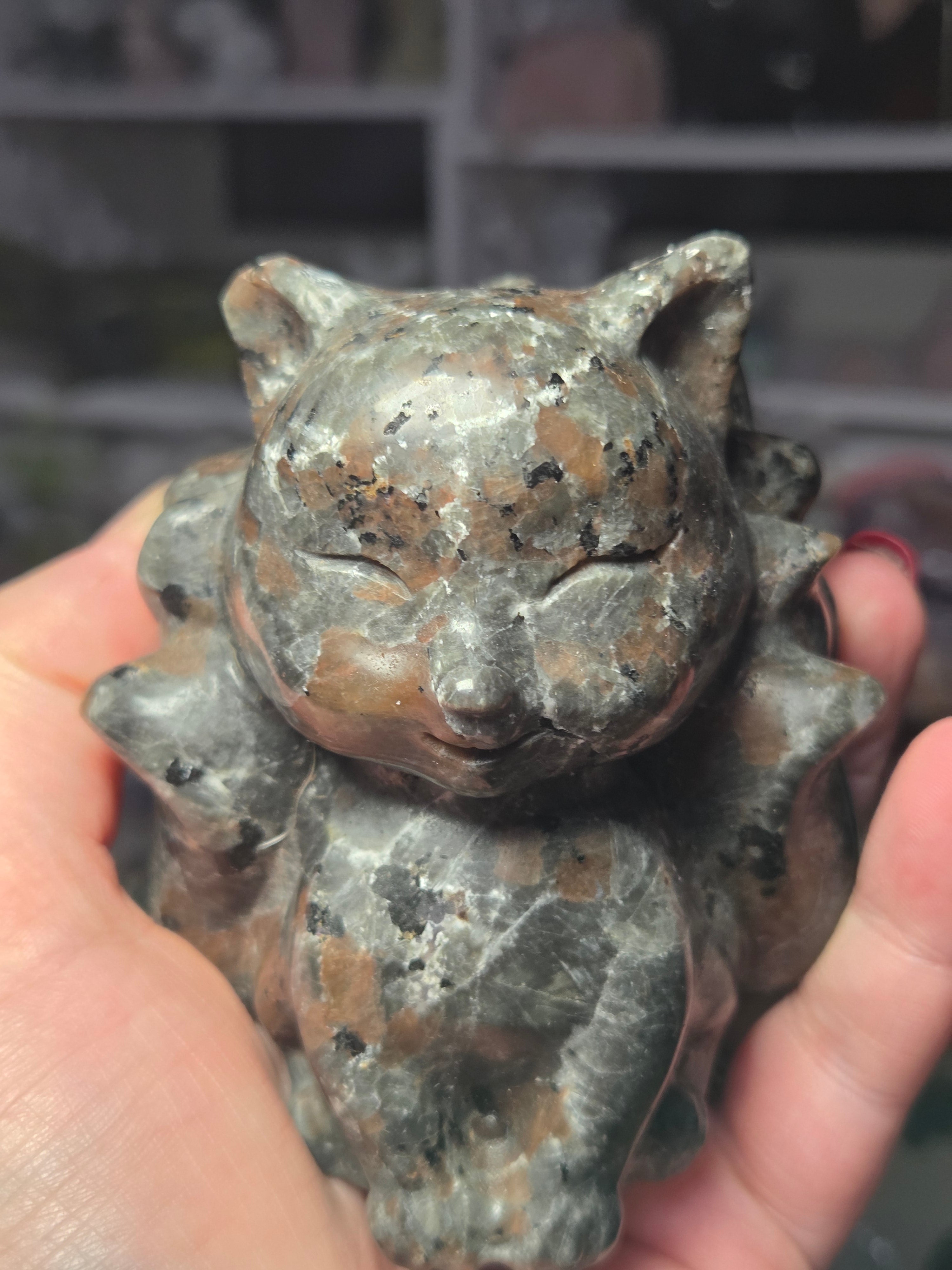 Large Yooperlite crystal 9 tail fox carving