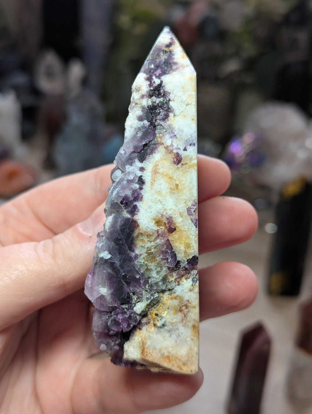 Raw flourite crystal tower carving