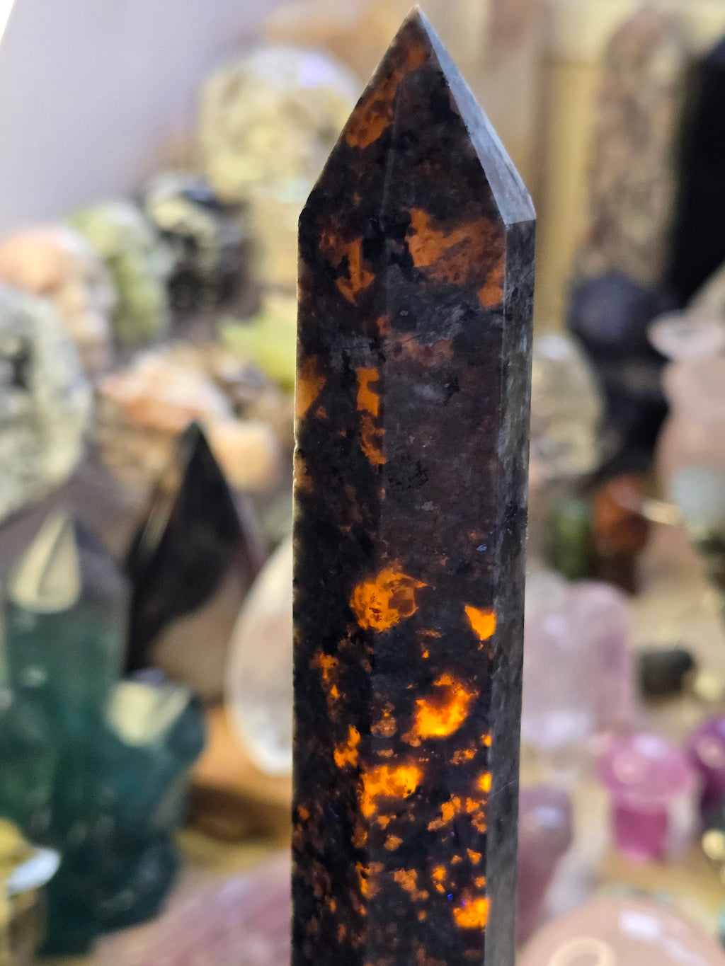 Large Yooperlite crystal tower with orange Uv