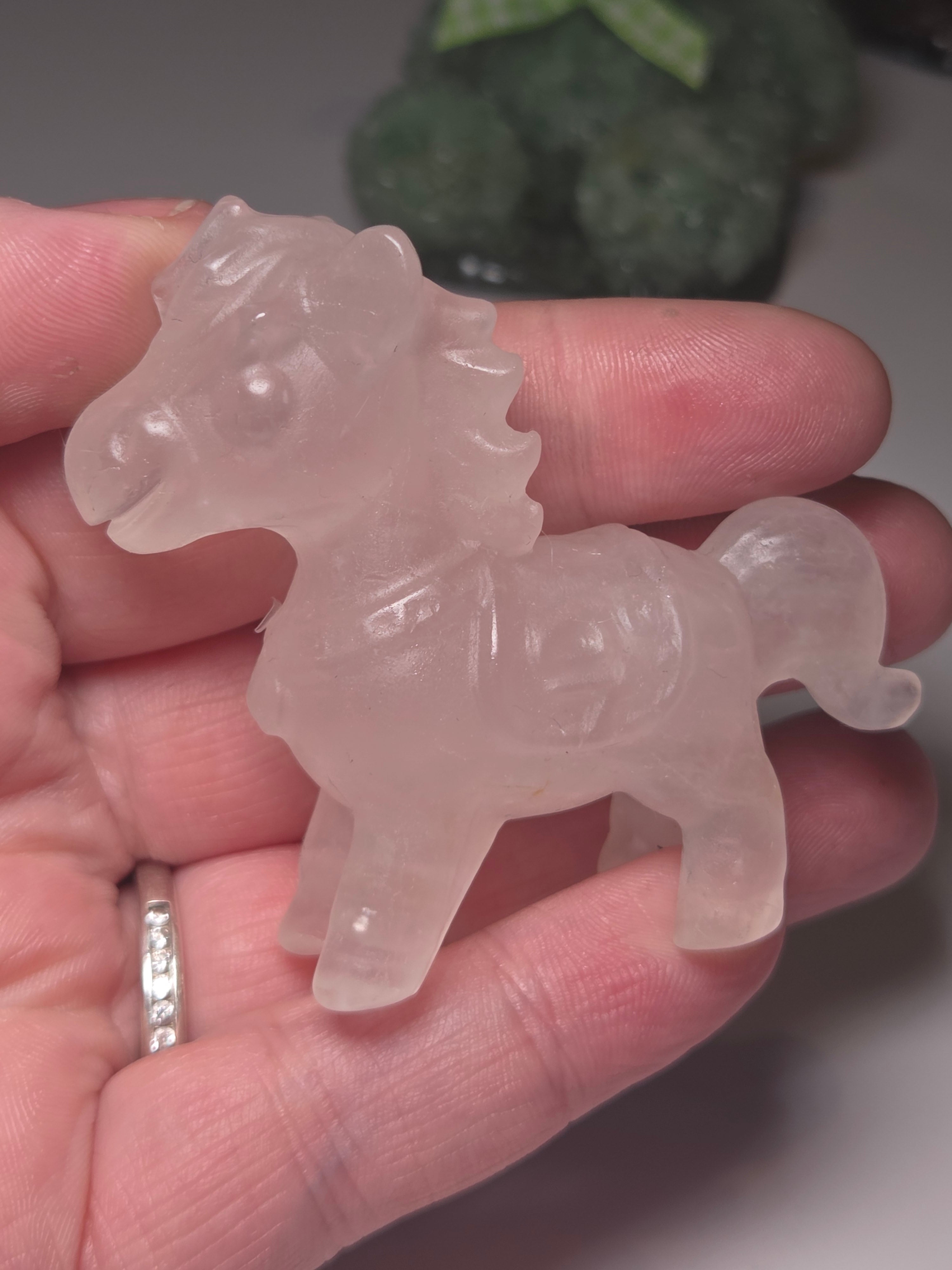 Rose quartz crystal horse carving