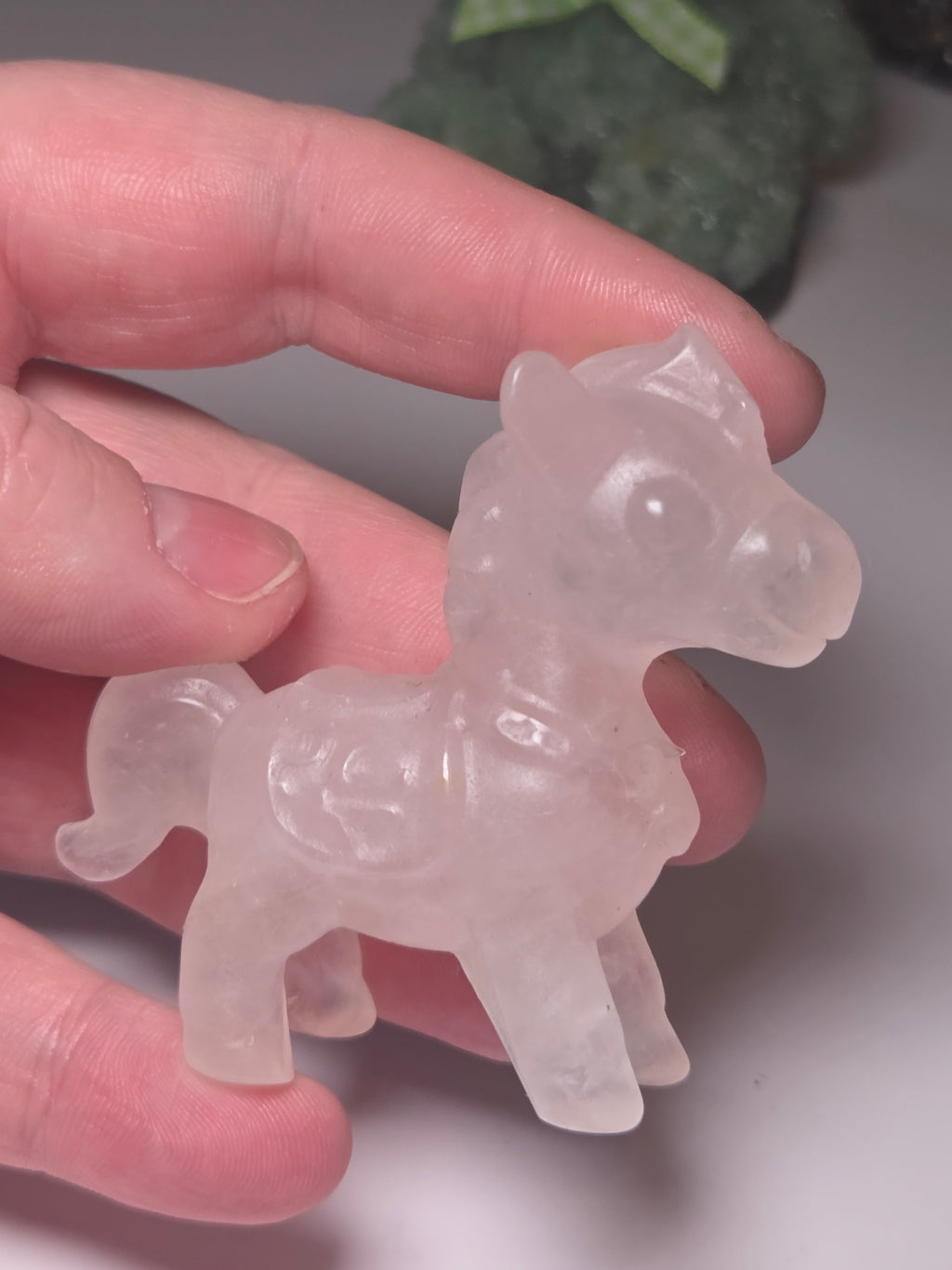 Rose quartz crystal horse carving