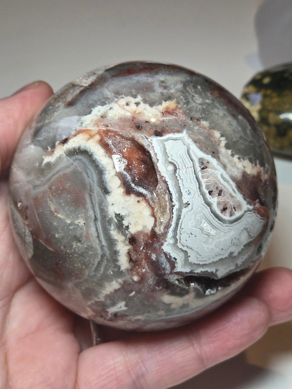 Mexican crazy lace agate crystal sphere  with imperfections
