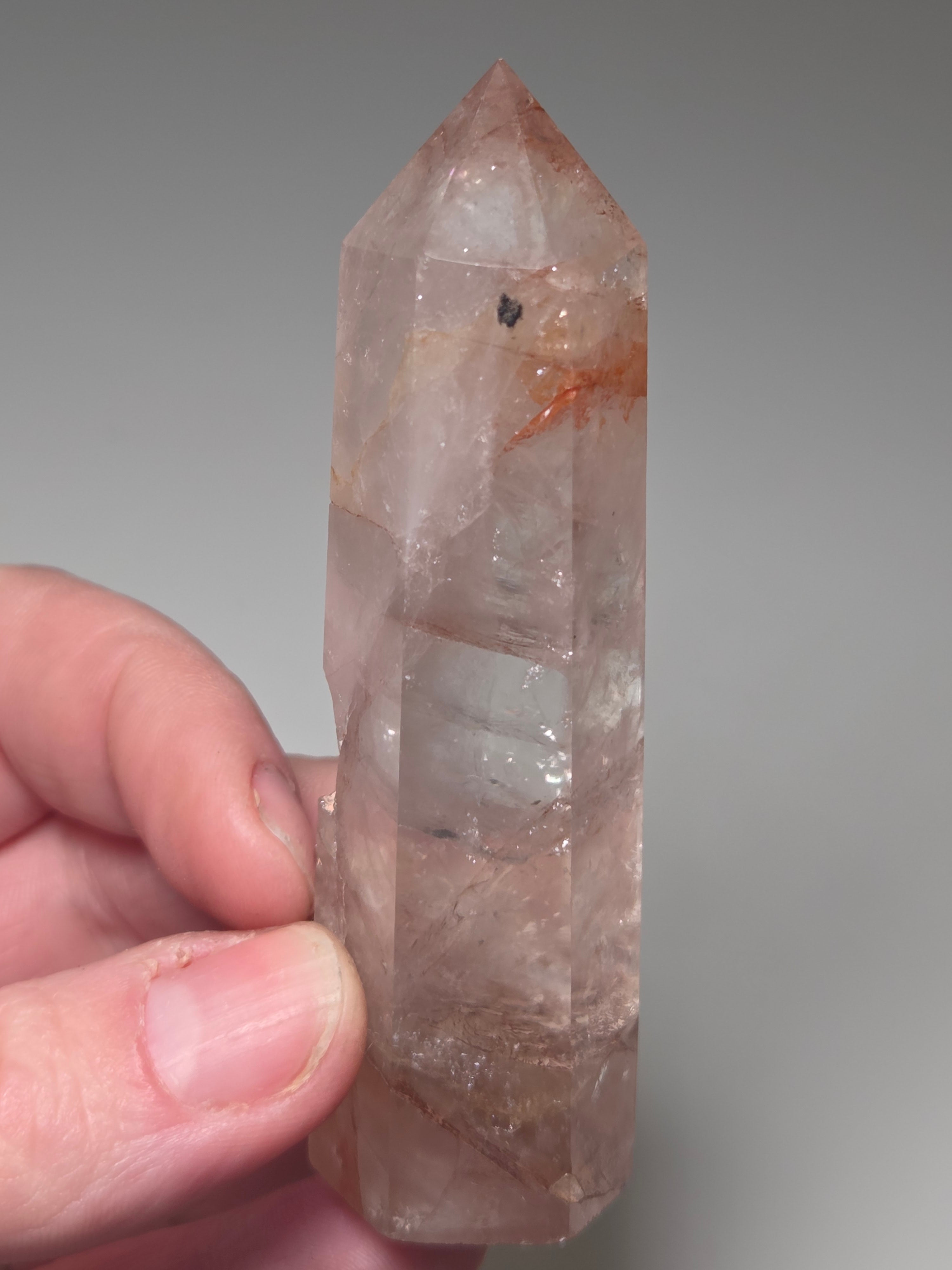 Fire quartz crystal tower with imperfections