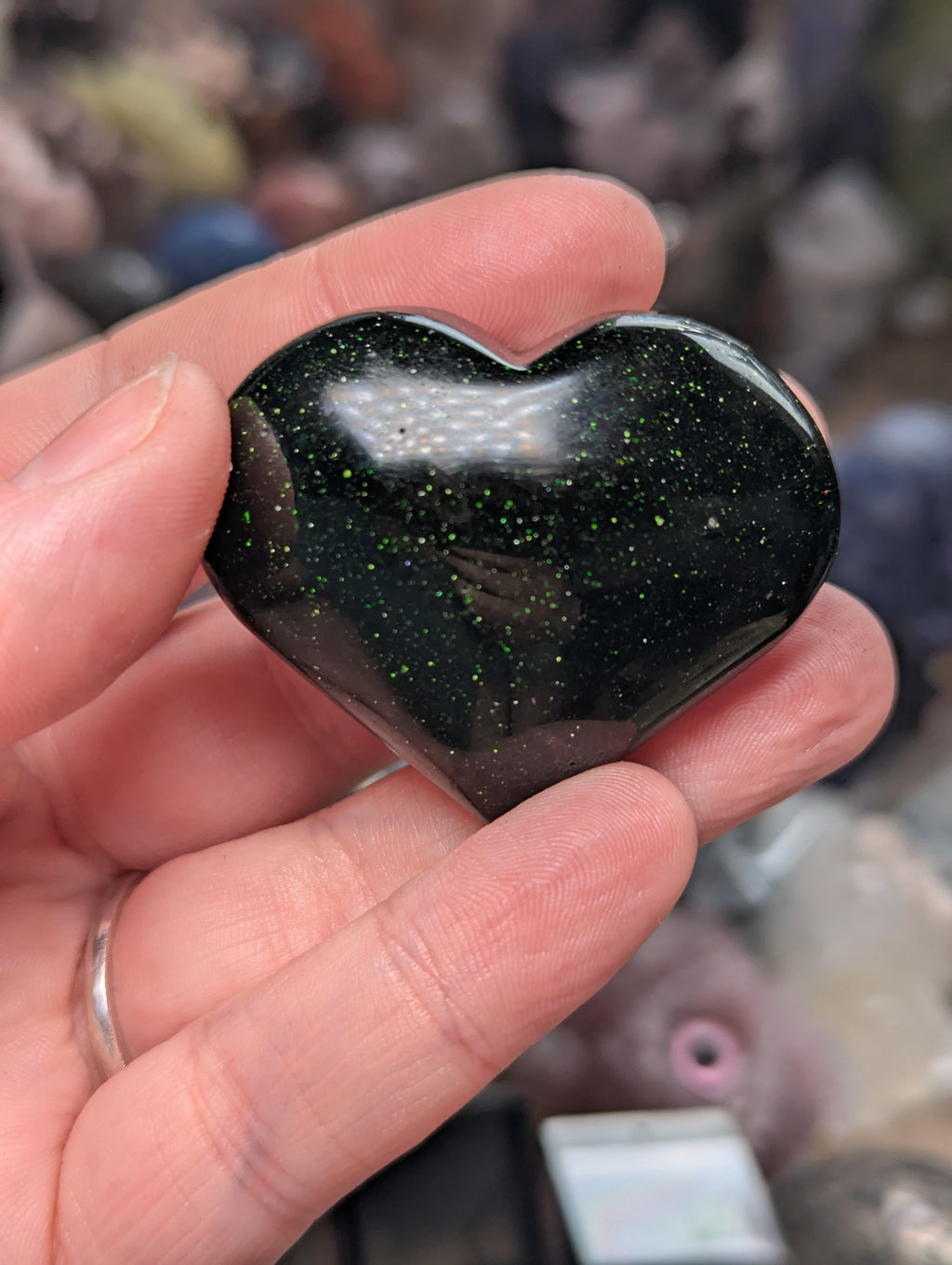 Green sandstone heart carving
