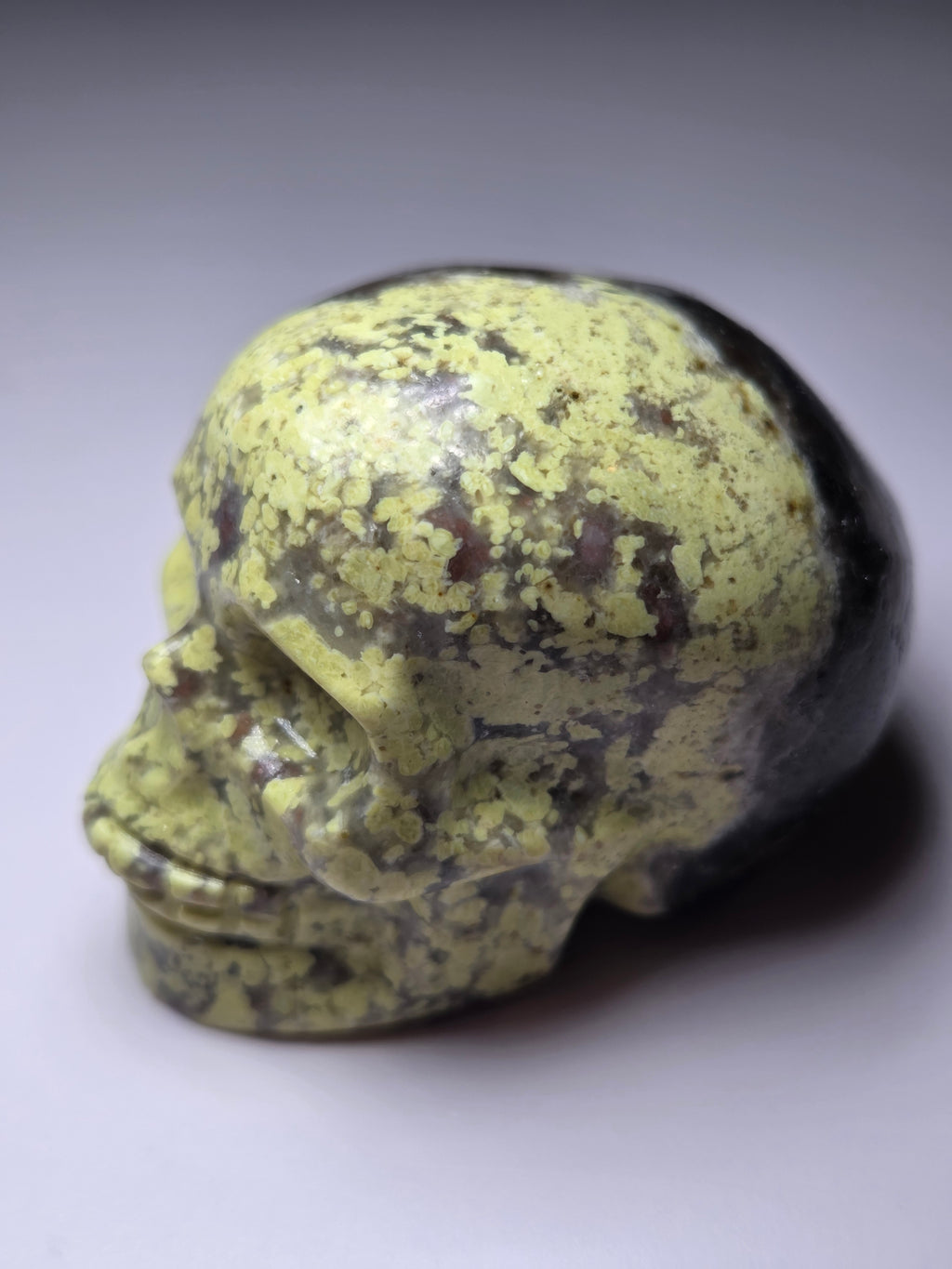 Green jade crystal skull carving
