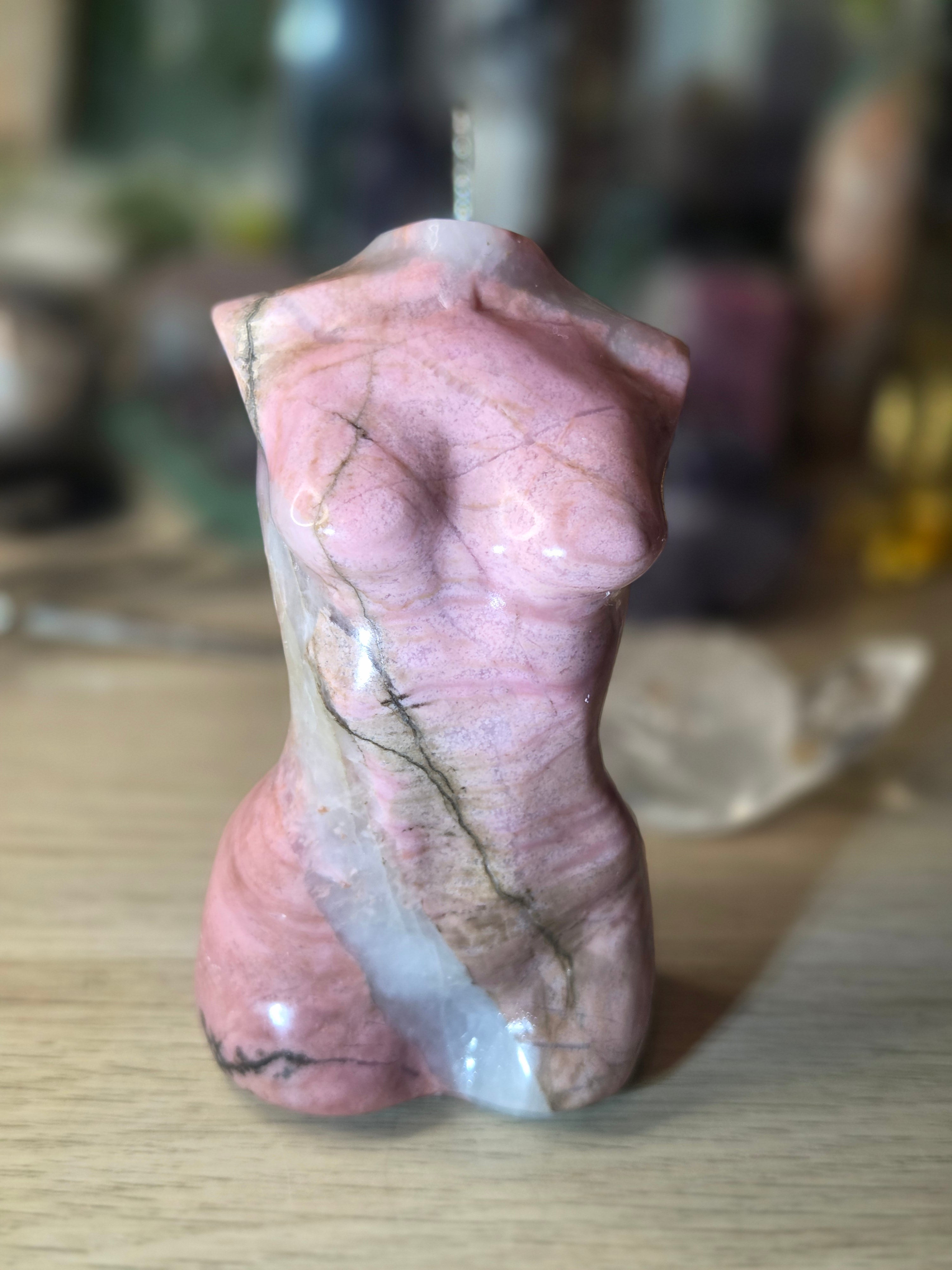 Rhodonite crystal female body carving
