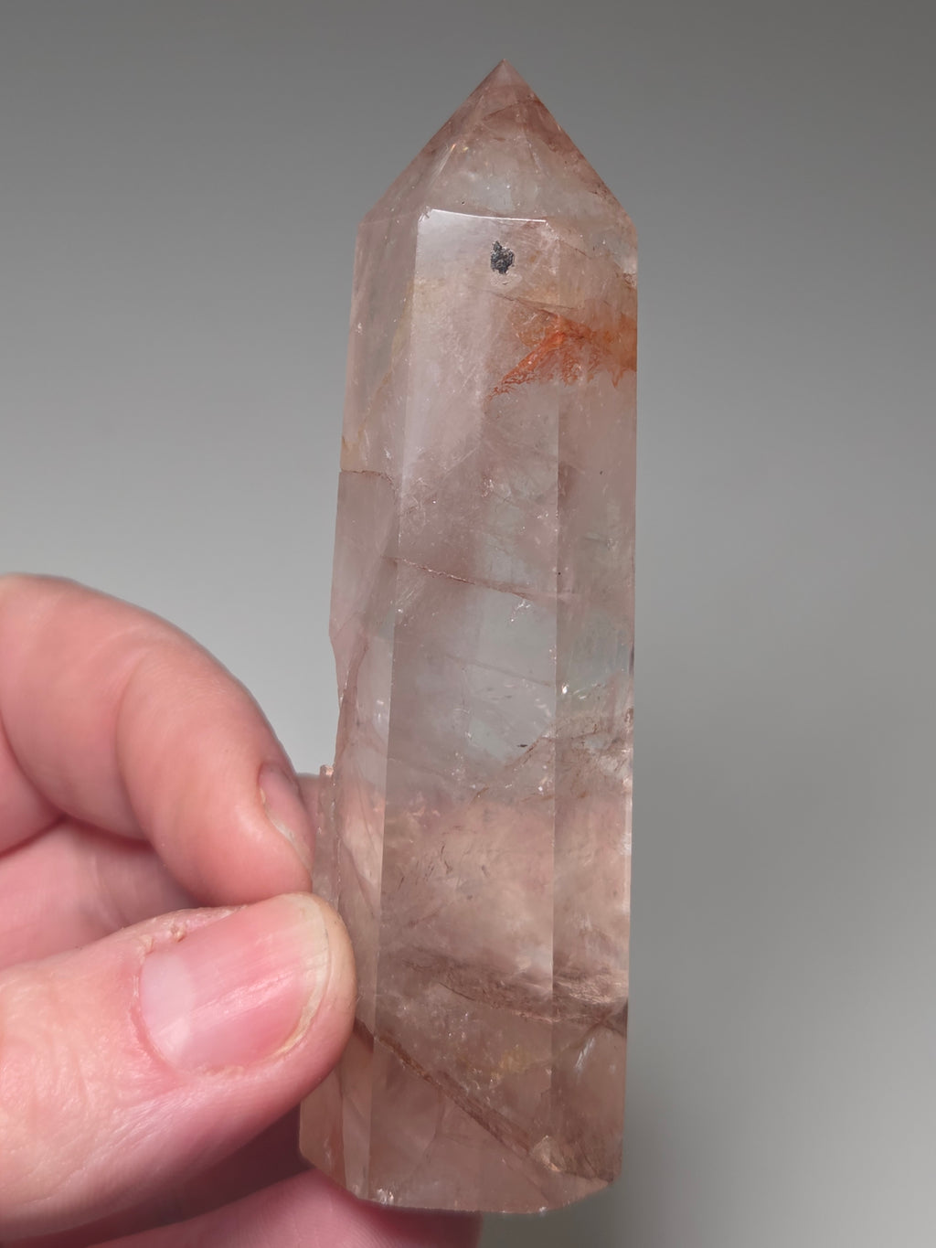 Fire quartz crystal tower with imperfections