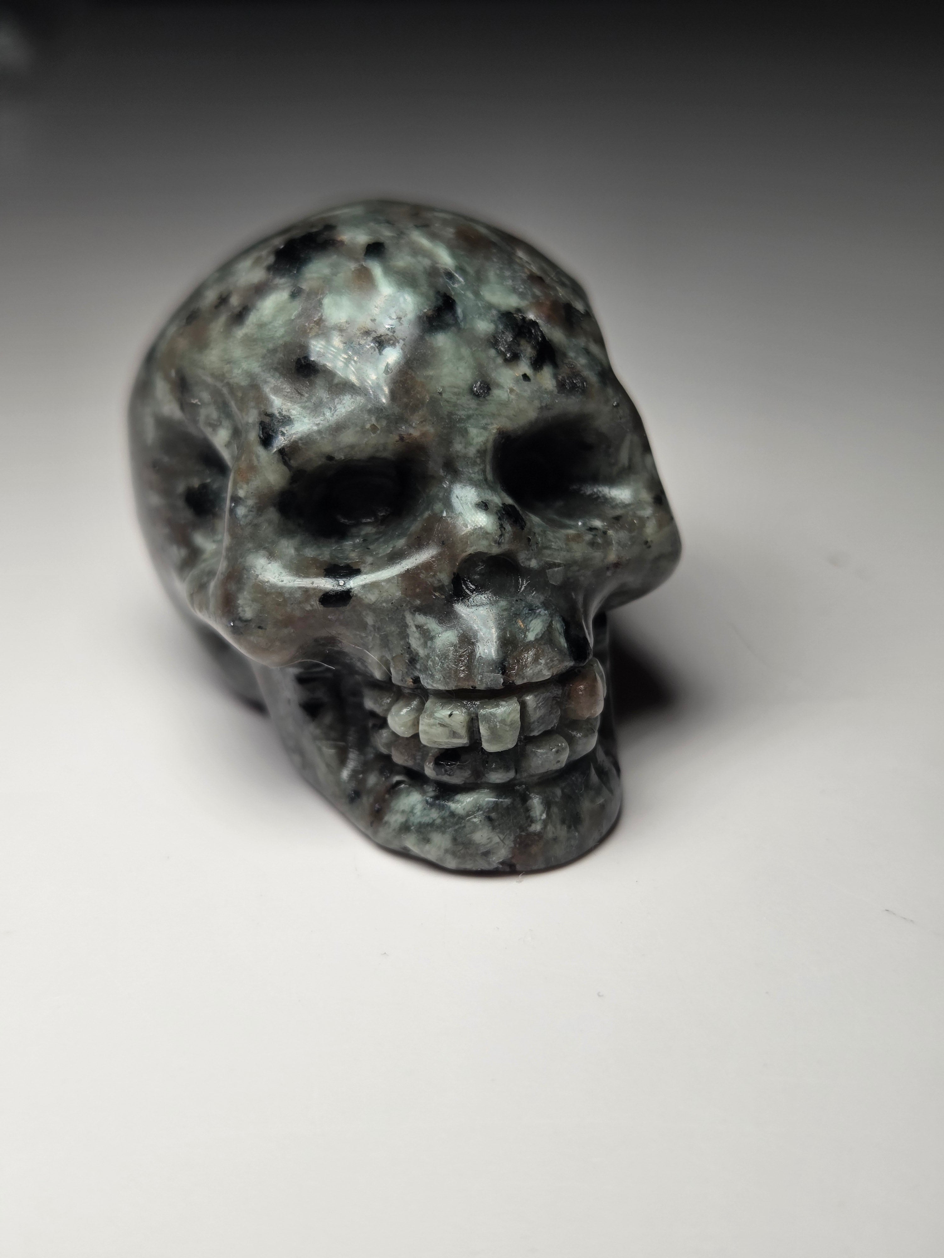 Small Yooperlite crystal skull carving